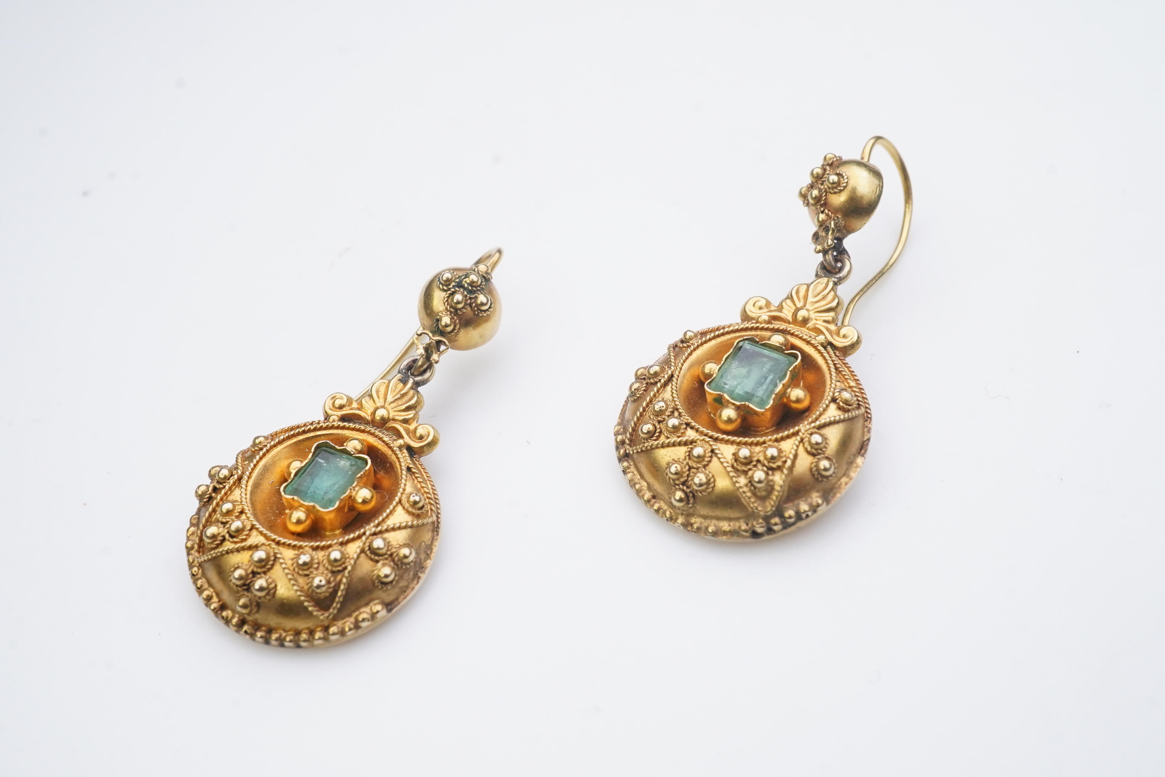 A pair of Victorian emerald and gold earrings, third quarter 19th century